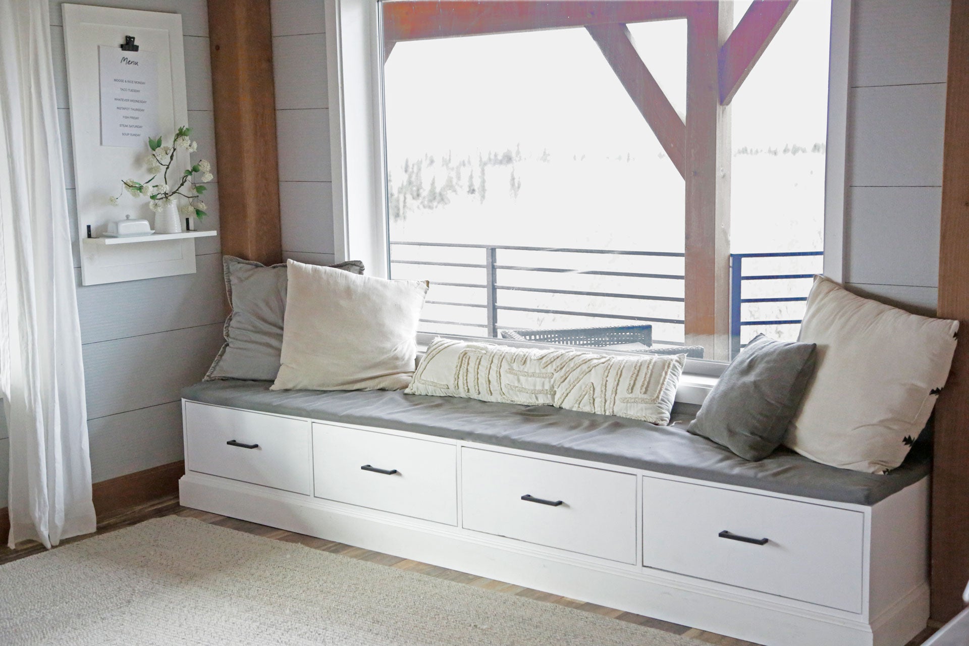 built in window seat with storage drawers